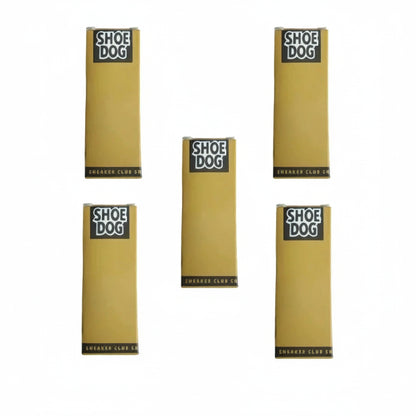 Five gold boxes with 'Shoe Dog' branding on a white background