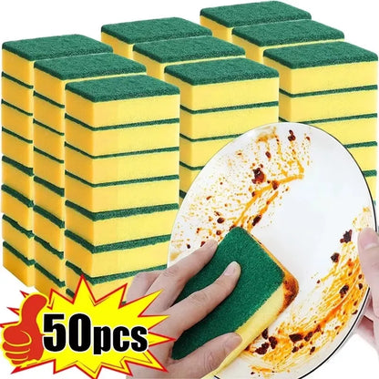 Stack of yellow sponges with green stripes and a hand cleaning a plate with food residue.