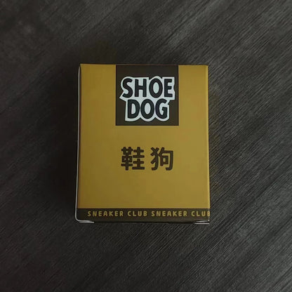 Book titled 'Shoe Dog' by Phil Knight on a wooden surface