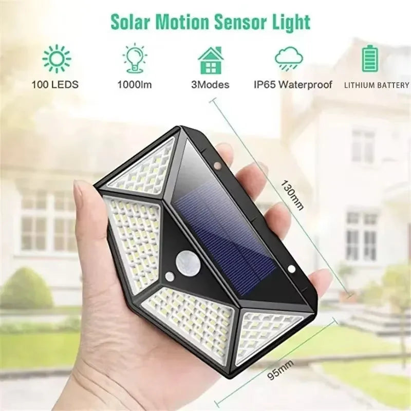 Solar motion sensor light held in a hand with specifications listed above.